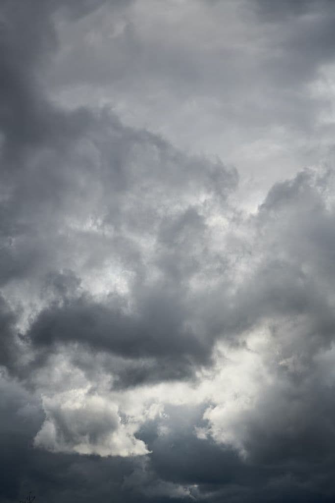 Gray, dense clouds in the sky.